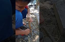 Tembakan Ikan Dari Kayu